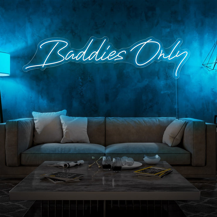 ice blue baddies only neon sign hanging on living room wall