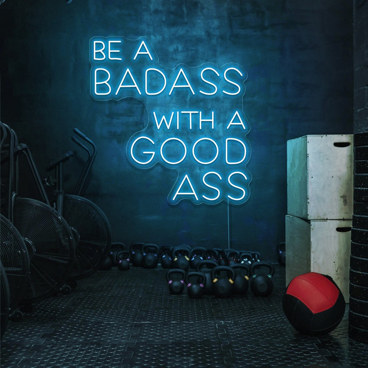 ice blue be a badass with a good ass neon sign hanging on gym wall