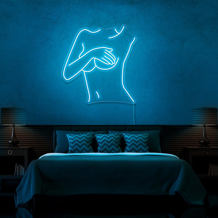 ice blue cover up neon sign hanging on bedroom wall