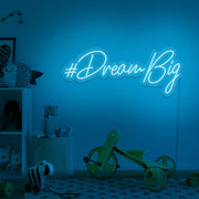 ice blue dream big neon sign hanging on kids bedroom wall