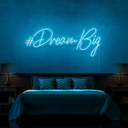 ice blue dream big neon sign hanging on bedroom wall