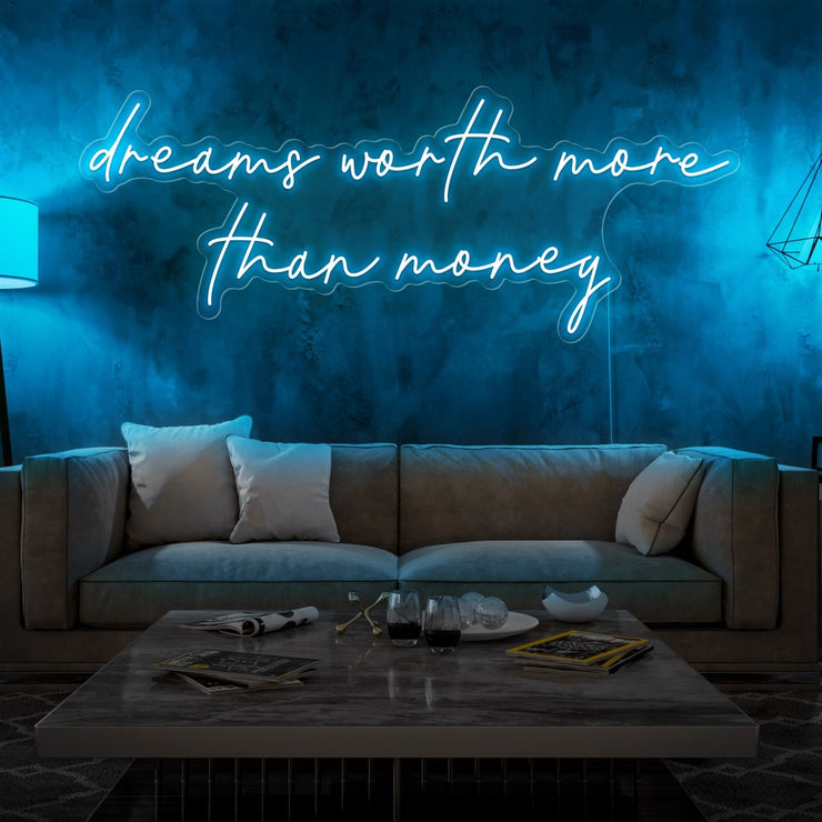 ice blue dreams worth more than money neon sign hanging on living room wall