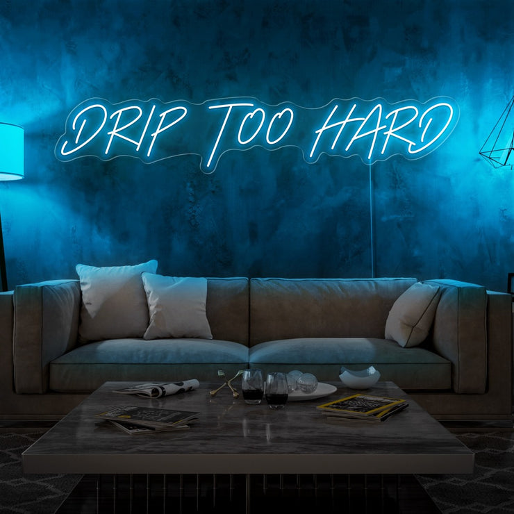 ice blue drip too hard neon sign hanging on living room wall