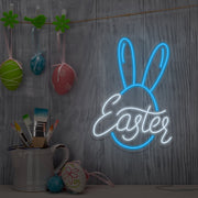ice blue easter bunny neon sign hanging on wall