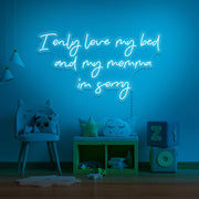 ice blue I only love my bed and my momma I'm sorry neon sign hanging on kids wall