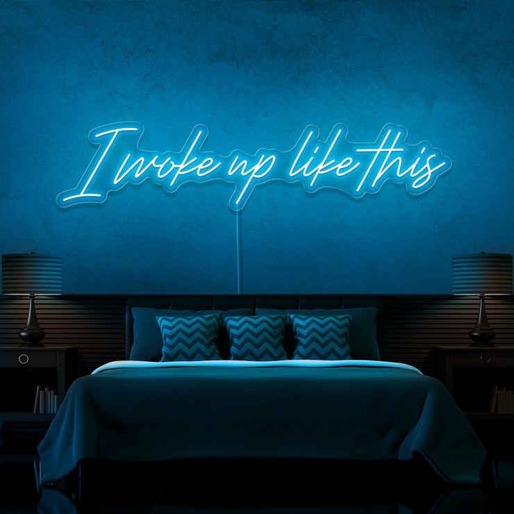 ice blue i woke up like this neon sign hanging on bedroom wall