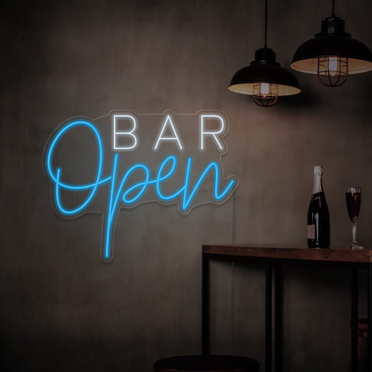 ice blue open bar neon sign hanging on bar wall