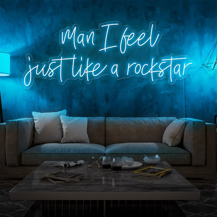 ice blue man i feel just like a rockstar neon sign hanging on living room wall