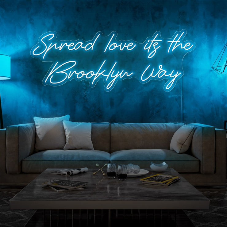ice blue spread love the brooklyn way neon sign hanging on living room wall