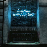 ice blue im talking wap wap wap neon sign hanging on bar wall
