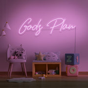 light pink Gods plan neon sign hanging on kids bedroom wall