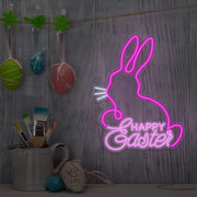 light pink happy easter bunny neon sign hanging on wall