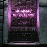 light pink mo money mo problems neon sign hanging on bar wall