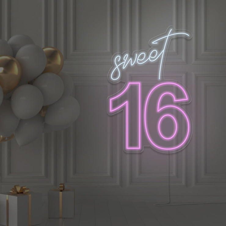 light pink sweet 16 neon sign hanging on wall