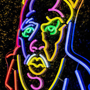 close up image of multi coloured biggie smalls neon sign