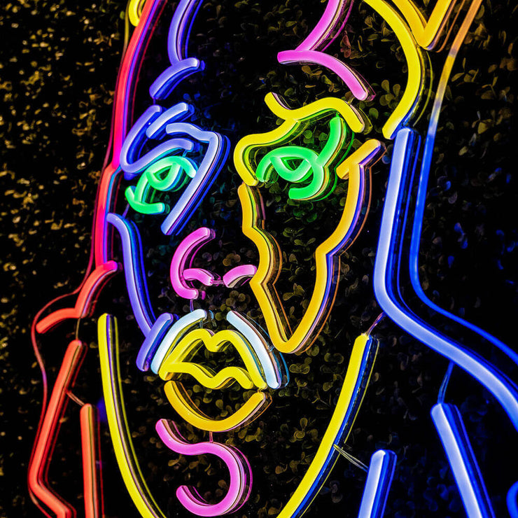 close up image of multi coloured biggie smalls neon sign
