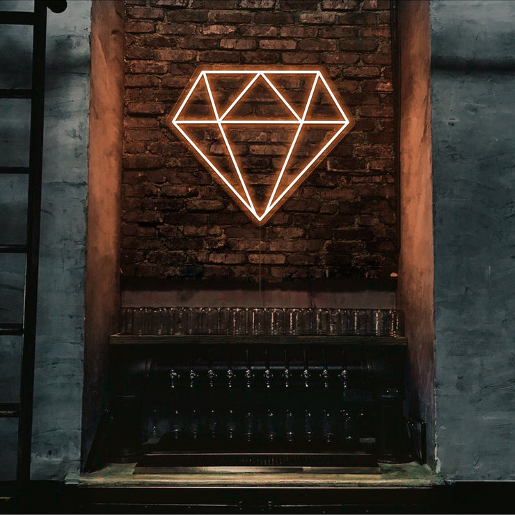 orange diamond neon sign hanging on bar wall