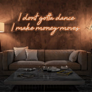 orange i dont gotta dance i make money moves neon sign hanging on living room wall