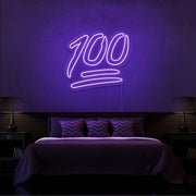 purple 100 neon sign hanging on bedroom wall