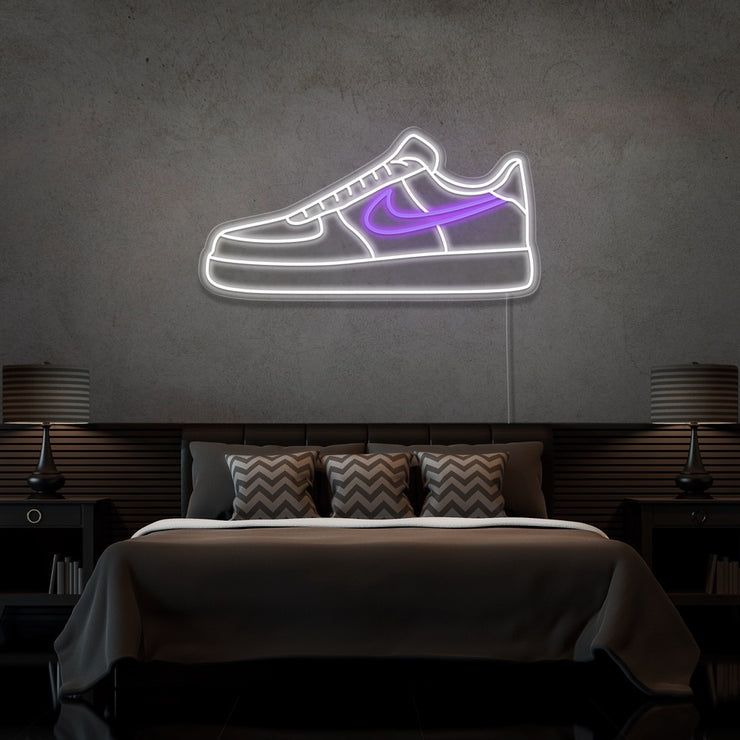 purple air force 1 nike sneaker neon sign hanging on bedroom wall