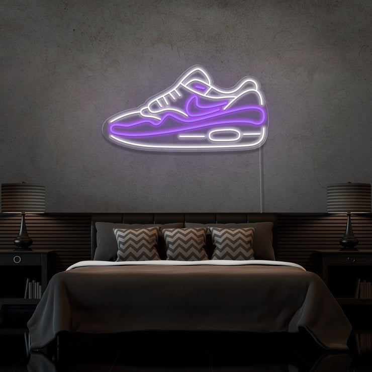 purple air max 1 sneaker neon sign hanging on bedroom wall