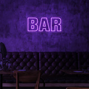 purple bar neon sign hanging on bar wall