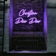 purple christian dior dior neon sign hanging on bar wall