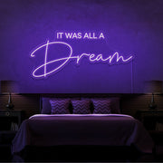 purple it was all a dream neon sign hanging on bedroom wall