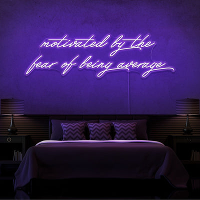purple motivated by the fear of being average neon sign hanging on bedroom wall