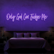 purple only god can judge me neon sign hanging on bedroom wall