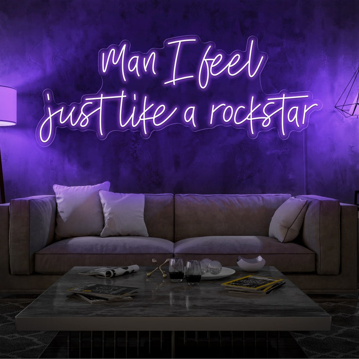 purple man i feel just like a rockstar neon sign hanging on living room wall
