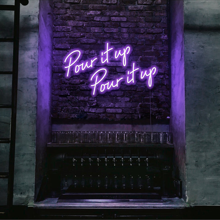 purple pour it up neon sign hanging on bar wall
