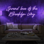 purple spread love the brooklyn way neon sign hanging on living room wall