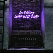 purple im talking wap wap wap neon sign hanging on bar wall