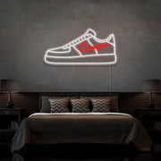 red air force 1 nike sneaker neon sign hanging on bedroom wall