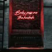 red baby pass me the hookah neon sign hanging on bar wall