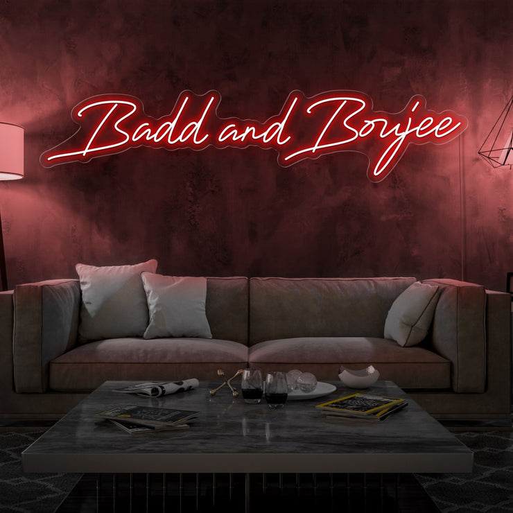 red bad and boujee neon sign hanging on living  room wall
