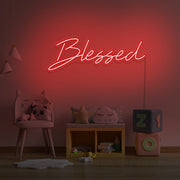 red neon sign hanging on kids bedroom wall
