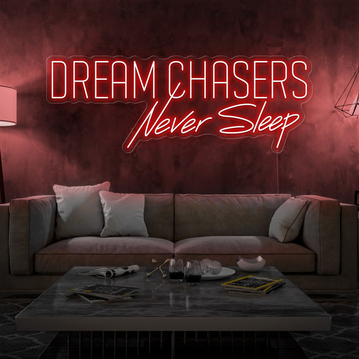 red dream chasers never sleep neon sign hanging on living room wall