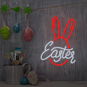 red easter bunny neon sign hanging on wall