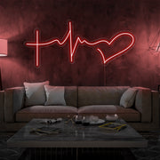 red faith hope and love neon sign hanging on living room wall