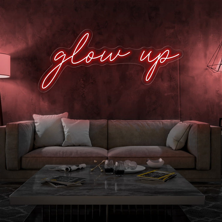red glow up neon sign hanging on living room wall