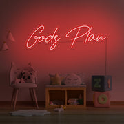 red Gods plan neon sign hanging on kids bedroom wall