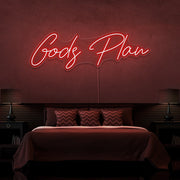 red gods plan neon sign hanging on bedroom wall