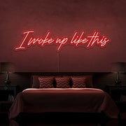 red i woke up like this neon sign hanging on bedroom wall