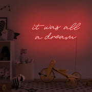 red it was all a dream neon sign hanging on kids bedroom wall