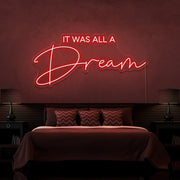 red it was all a dream neon sign hanging on bedroom wall