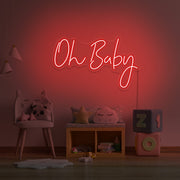 red oh baby neon sign hanging on kids bedroom wall