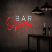 red open bar neon sign hanging on bar wall