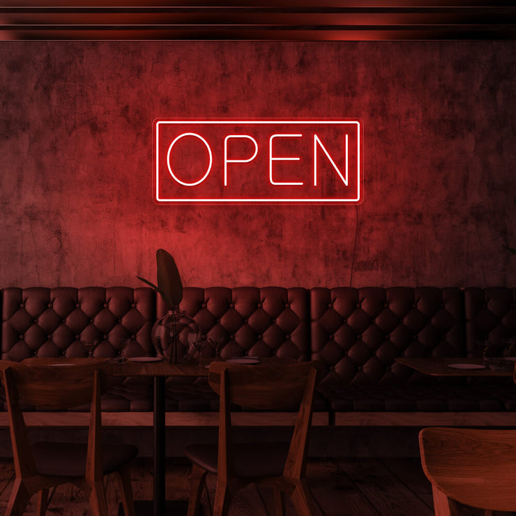 red open neon sign hanging on cafe wall
